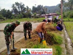 Bersama Warga, Satgas TMMDN Kodim 0306/50 Kota Goro Bersama Warga