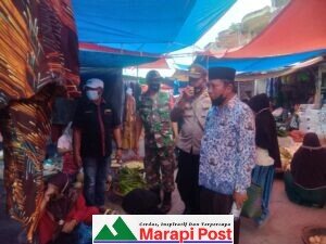 Nagari Kinali  Vaksinasi Pedagang dan Pengunjung Pasar