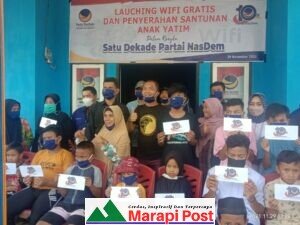 DPD Nasdem Pasaman Serahkan Santunan Warga Sekitar Kantor